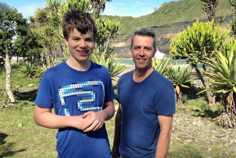 father and son in African countryside