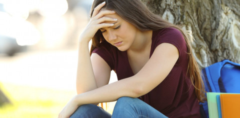 young woman looking anxious