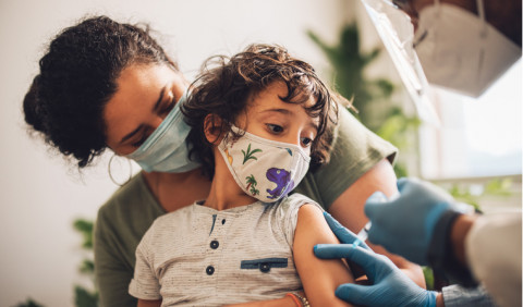 child getting vaccinated