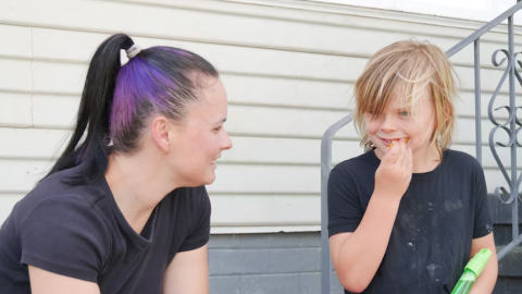 Jessica Otter with her son Jacob, who is minimally verbal. (ABC News: Bridget Murphy)