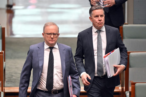 Albo and Butler walking down stairs