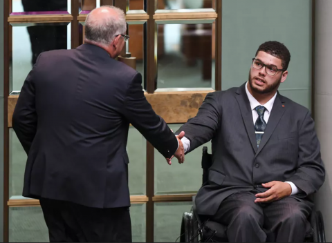 Seantor Jordon Steele-John shakes ScoMo's hand as ScoMo leaves before the vote on a Royal Commission