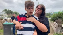 mother holding her autistic son