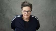 Hannah Gadsby looking up towards the camera
