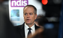 Minister Bill Shorten head image with NDIS logo in the background