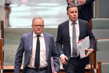 Albo and Butler walking down stairs