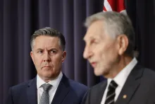 inister for Disability and the NDIS Mark Butler listens to Frank Oberklaid, co-chair of the Thriving Kids Advisory Group